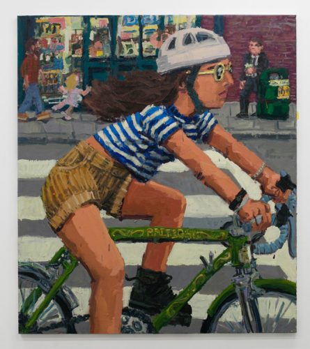 A person riding on the back of a bicycle Description automatically generated