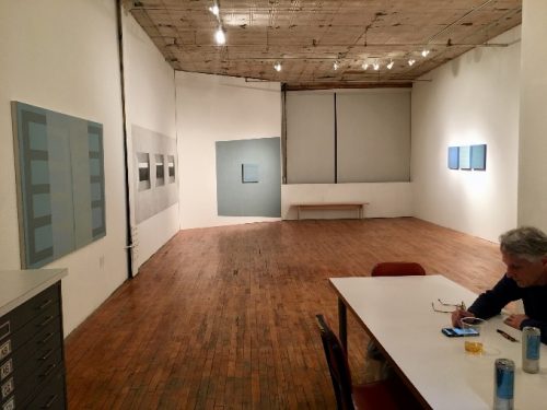 A person standing in a room Description automatically generated