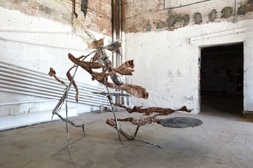 A picture containing building, ground, outdoor, floor Description automatically generated