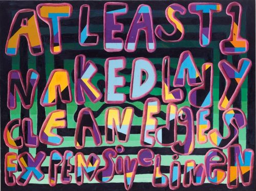 A graffiti covered wall Description automatically generated