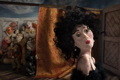 A person sitting in a room Description automatically generated