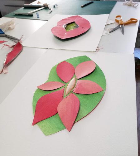 A picture containing table, indoor, sitting, plate Description automatically generated