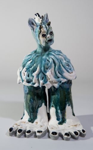 A picture containing indoor, sitting, table, decorated Description automatically generated