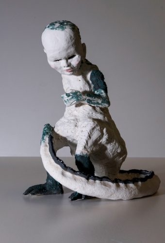 A picture containing indoor, sitting, table, small Description automatically generated