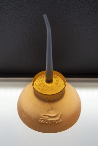 A picture containing indoor, table, sitting, small Description automatically generated