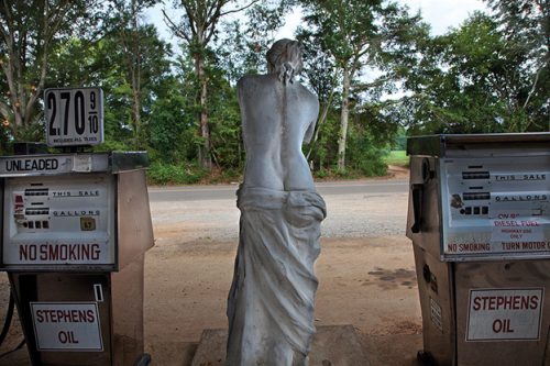 A sign on the side of the street Description automatically generated