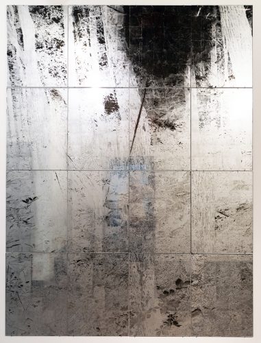 A picture containing building, white, dirty, sitting Description automatically generated