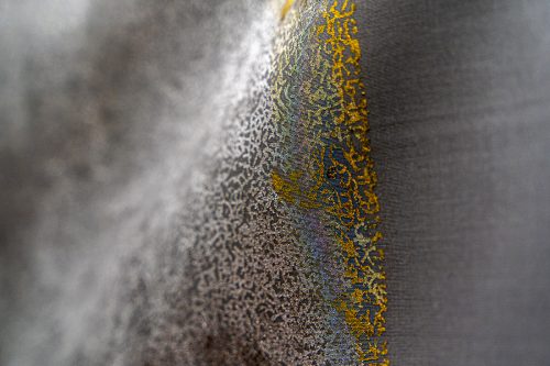 A picture containing necktie, man, gray, grey Description automatically generated