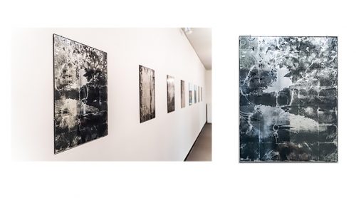 A room with art on the wall Description automatically generated