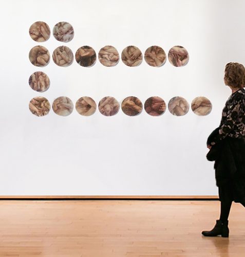 A picture containing person, standing, young, holding Description automatically generated