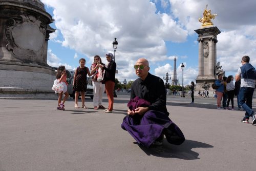 A picture containing outdoor, road, person, building Description automatically generated