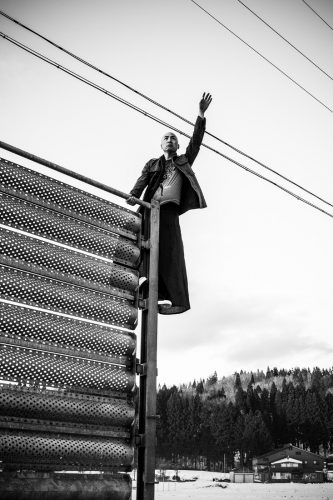 A sign on a pole Description automatically generated