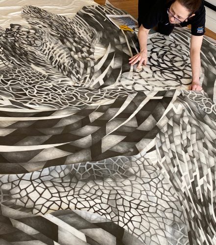 A picture containing person, laying Description automatically generated