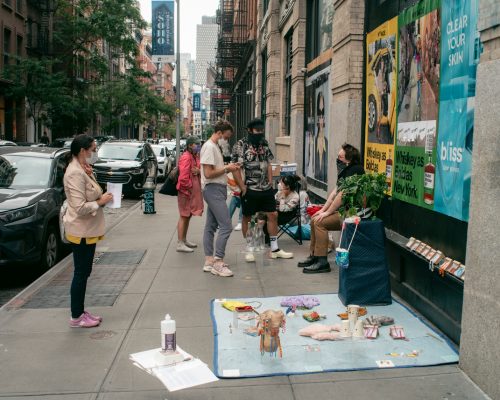 A picture containing text, building, outdoor, scene Description automatically generated