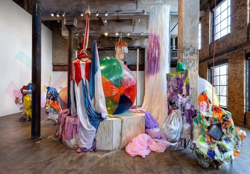 A picture containing clothes, cluttered Description automatically generated