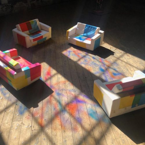 A picture containing text, indoor, book, floor Description automatically generated