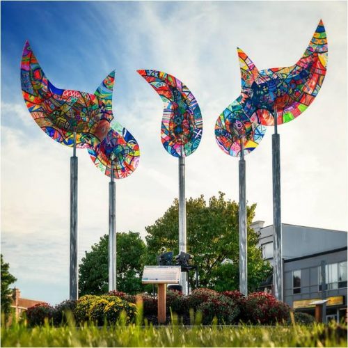 A picture containing sky, outdoor, grass, colorful Description automatically generated