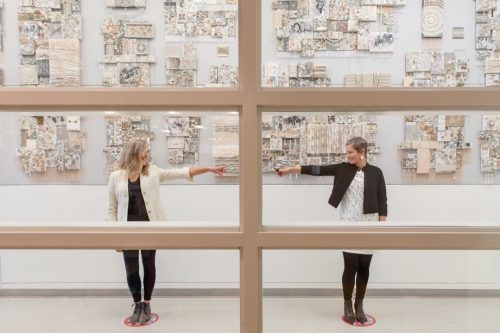 A picture containing text, indoor, window Description automatically generated