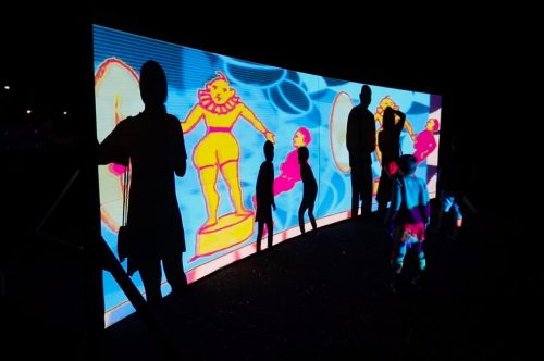 A picture containing text, dark Description automatically generated