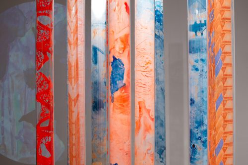 A picture containing text, orange, painted Description automatically generated