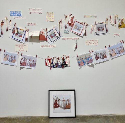 A picture containing text, wall, gallery, indoor Description automatically generated