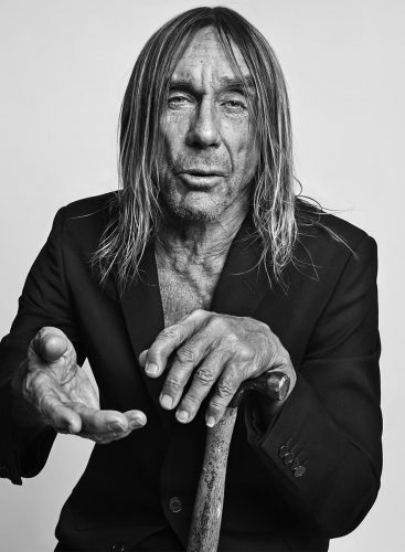 A person holding a baseball bat Description automatically generated with medium confidence