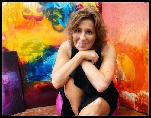 A person posing for a picture Description automatically generated with medium confidence