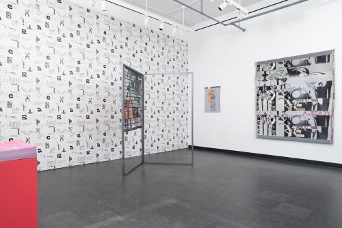 A room with posters on the wall Description automatically generated with low confidence