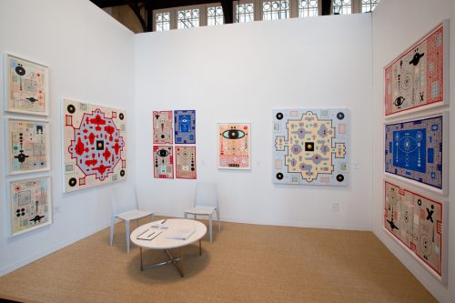 A room with posters on the wall Description automatically generated with medium confidence