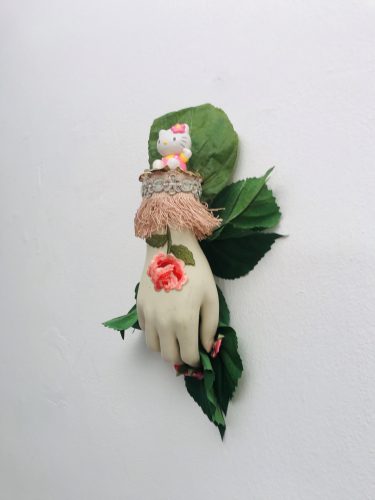 A picture containing doll, toy Description automatically generated