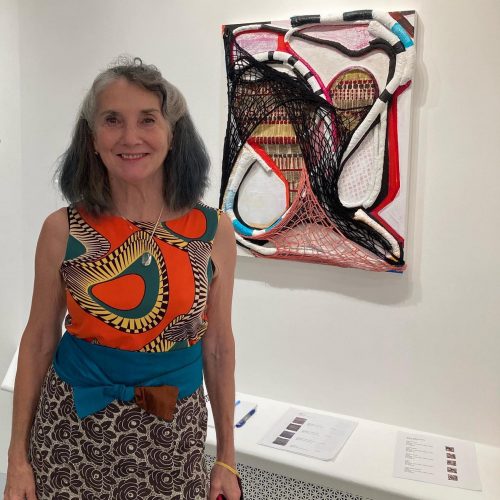 A picture containing text, wall, person, indoor Description automatically generated