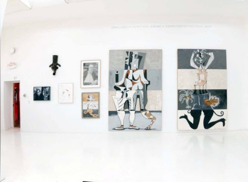 A picture containing text, room, gallery, indoor Description automatically generated