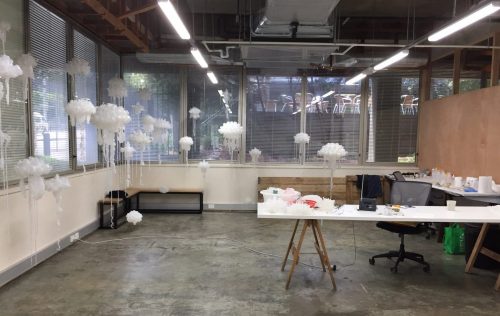 A picture containing indoor, floor, area, table Description automatically generated