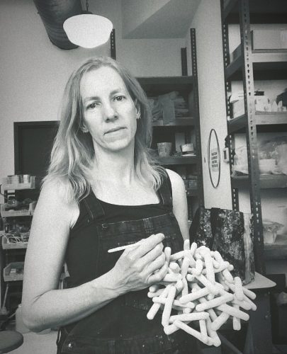 A picture containing text, person, indoor, person Description automatically generated