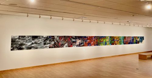 A wall with art on it Description automatically generated with low confidence