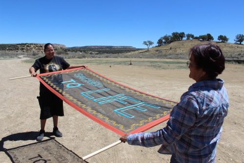 A picture containing sky, outdoor, ground, person Description automatically generated