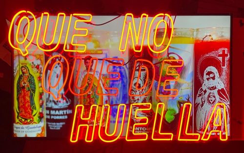 A picture containing text, graffiti, painted Description automatically generated