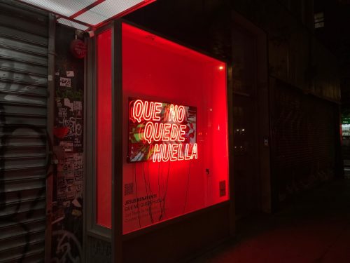 A picture containing text, red, outdoor, sign Description automatically generated