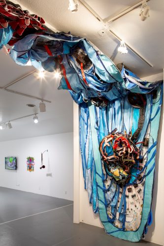 A picture containing indoor, clothes Description automatically generated