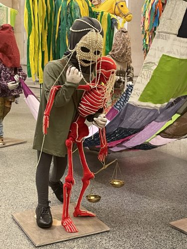 A person in a garment Description automatically generated with low confidence