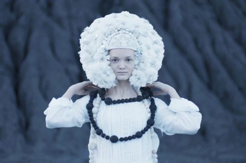 A picture containing person, white Description automatically generated