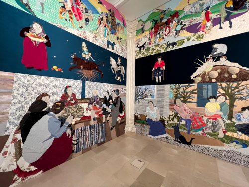 A picture containing text, indoor, bedroom, decorated Description automatically generated