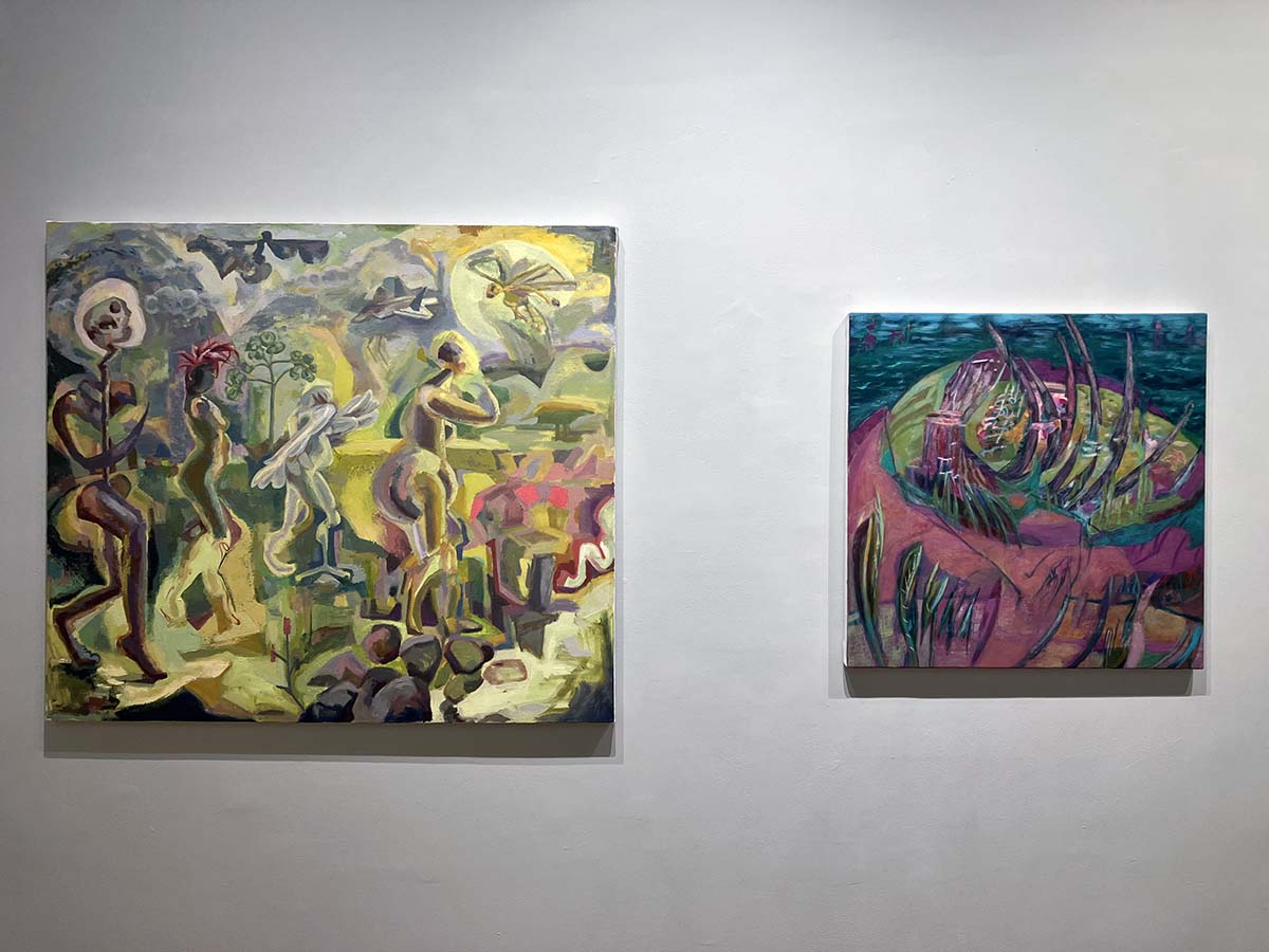 A couple of paintings on a wall

Description automatically generated with medium confidence