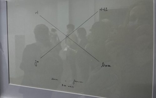 A picture containing text, whiteboard Description automatically generated