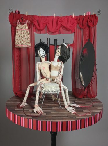 A picture containing indoor, red, furniture, curtain Description automatically generated