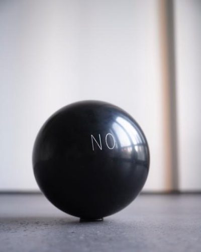 A picture containing sport, indoor, sitting, pool ball Description automatically generated