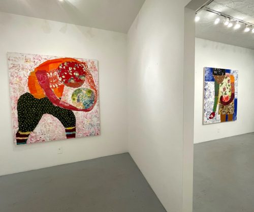 A couple of paintings on a wall Description automatically generated with low confidence