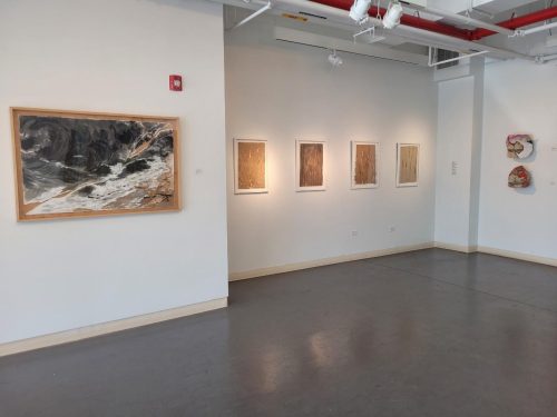 A picture containing indoor, scene, room, gallery Description automatically generated