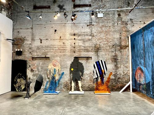 A picture containing building, graffiti Description automatically generated