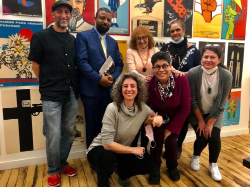 A group of people posing for a photo Description automatically generated